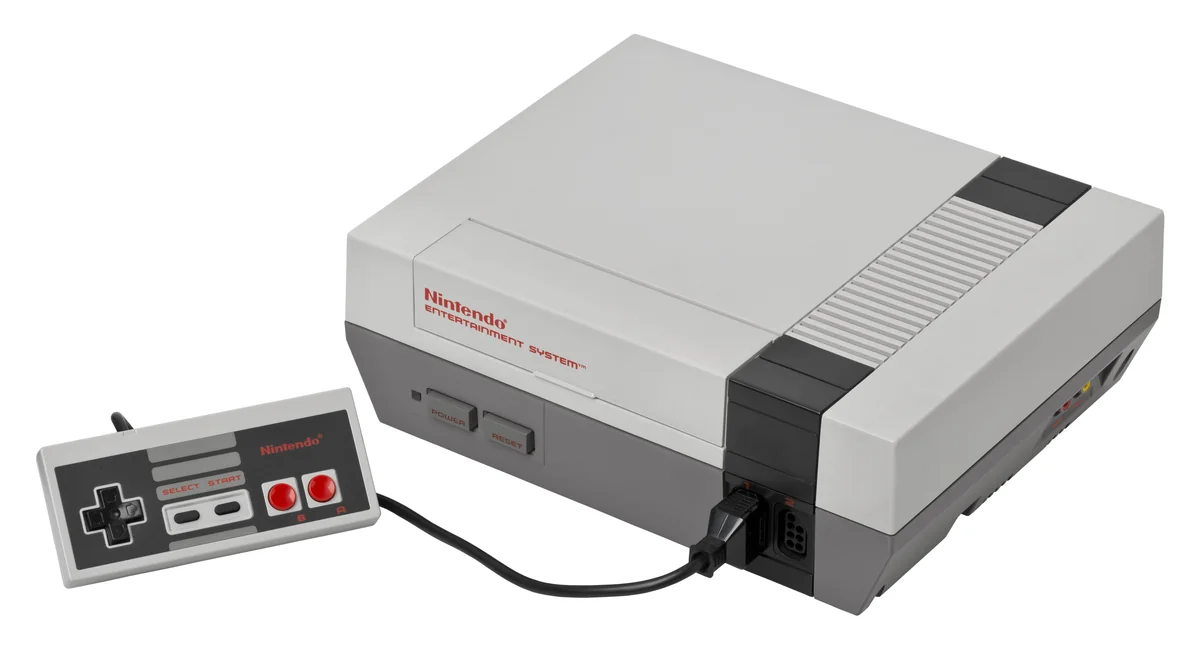 Console Nintendo NES avec sa manette et ses accessoires